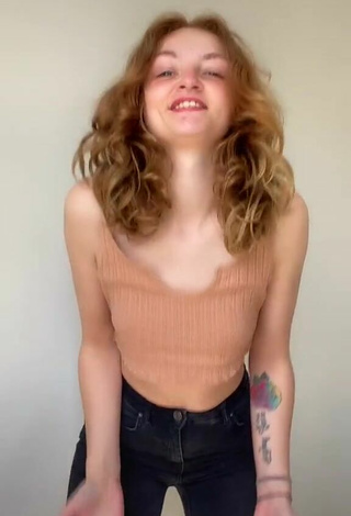 2. Titillating Leah Allington in Beige Crop Top