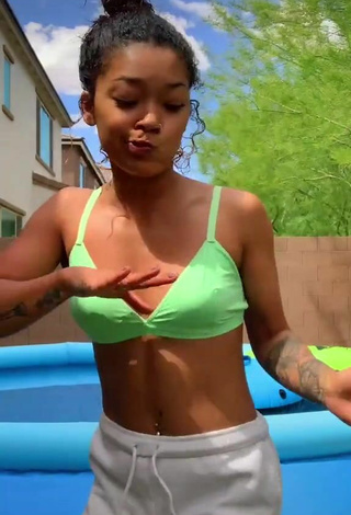 5. Sultry Leilani Green in Light Green Bikini Top at the Swimming Pool