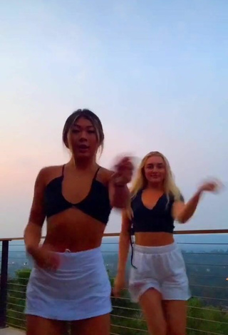 5. Sultry Lily Hirata in Black Crop Top on the Balcony