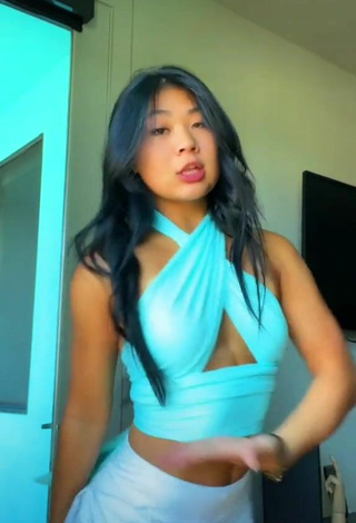 5. Titillating Lily Hirata in Blue Crop Top