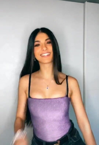 2. Sultry Elisa Maino in Purple Top