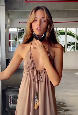 2. Sultry Makayla Storms in Beige Sundress