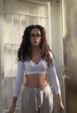 3. Sultry María Romero in White Crop Top