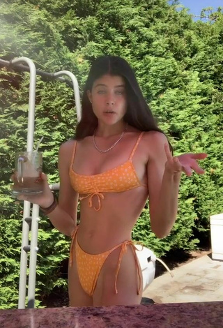 Cute Nicole Johnson in Orange Bikini