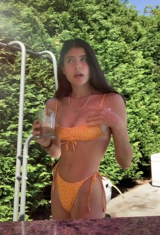 3. Cute Nicole Johnson in Orange Bikini