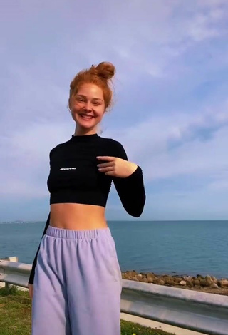 5. Hot Alyssa Holum in Black Crop Top in the Sea