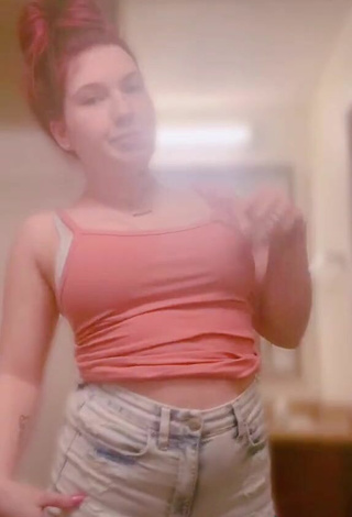 5. Luscious Starann Gibson in Peach Crop Top