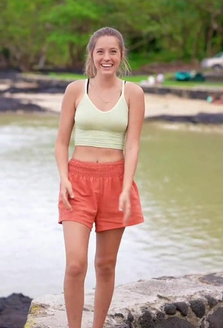 2. Sultry Peyton Coffee in Light Green Crop Top at the Beach