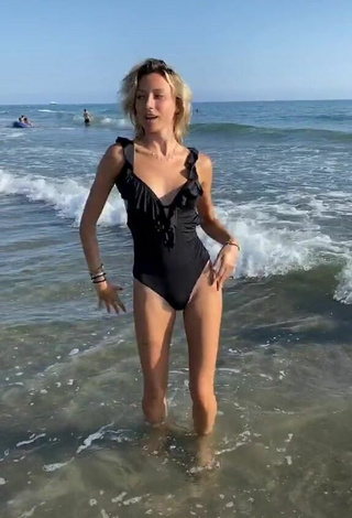 3. Hot Martina Picardi in Black Swimsuit at the Beach