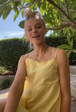 3. Sultry Rory Eliza in Yellow Sundress