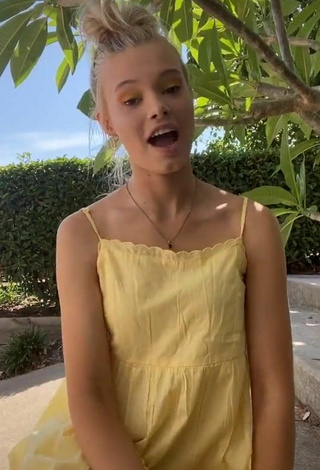 4. Sultry Rory Eliza in Yellow Sundress