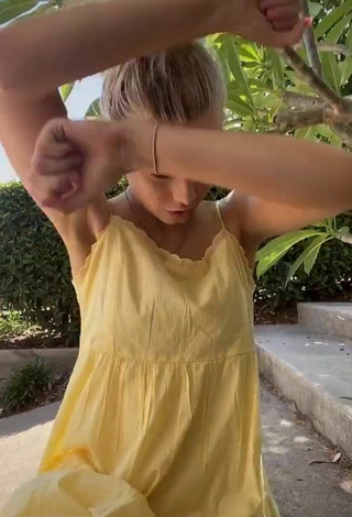 5. Sultry Rory Eliza in Yellow Sundress