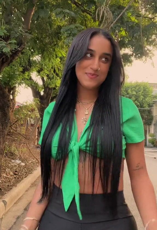 Wonderful Jenny Camacho Shows Cleavage in Green Crop Top in a Street