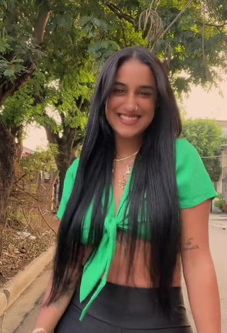 2. Wonderful Jenny Camacho Shows Cleavage in Green Crop Top in a Street