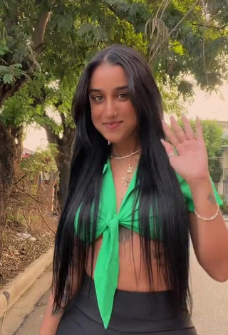 3. Wonderful Jenny Camacho Shows Cleavage in Green Crop Top in a Street