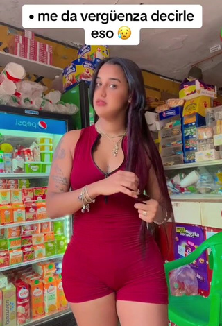 Beautiful Jenny Camacho Shows Cleavage in Sexy Red Overall