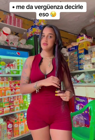 2. Beautiful Jenny Camacho Shows Cleavage in Sexy Red Overall