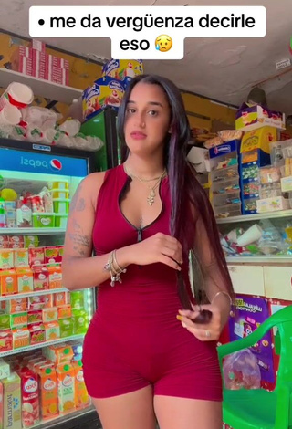 3. Beautiful Jenny Camacho Shows Cleavage in Sexy Red Overall