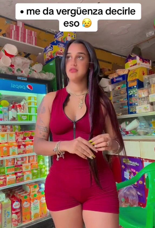 6. Beautiful Jenny Camacho Shows Cleavage in Sexy Red Overall