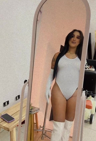 Sultry Jenny Camacho in White Bodysuit