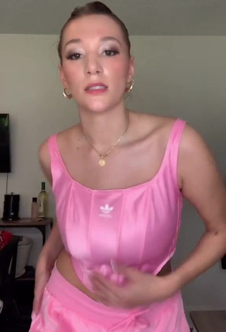 Cute Jessica Ortiz Shows Cleavage in Pink Crop Top