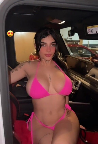 3. Titillating Karely Ruiz Shows Cleavage in Pink Bikini in a Car (Side Boob)