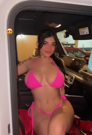 5. Titillating Karely Ruiz Shows Cleavage in Pink Bikini in a Car (Side Boob)