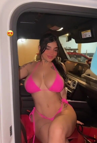 6. Titillating Karely Ruiz Shows Cleavage in Pink Bikini in a Car (Side Boob)