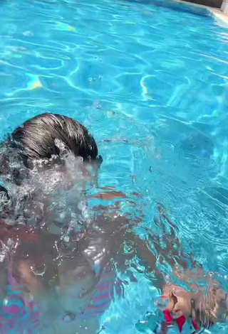 2. Adorable Lola Moreno Marco Shows Cleavage in Seductive Striped Bikini Top at the Pool (Side Boob)