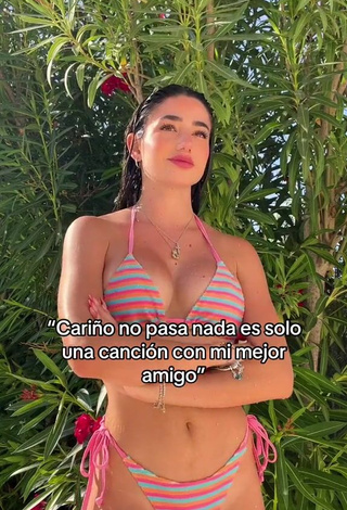 Titillating Lola Moreno Marco Shows Cleavage in Striped Bikini (Side Boob)