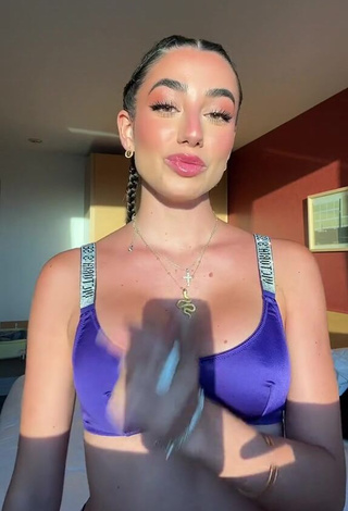 3. Beautiful Lola Moreno Marco Shows Cleavage in Sexy Purple Bikini Top