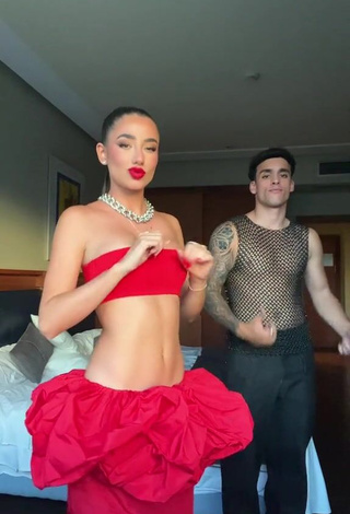 5. Titillating Lola Moreno Marco Shows Cleavage in Red Tube Top