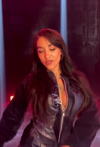 4. Luscious Maria Becerra Shows Cleavage in Black Overall (Side Boob)