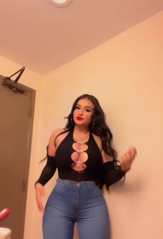 3. Luscious Marlene Santana Shows Cleavage in Black Top (Side Boob)