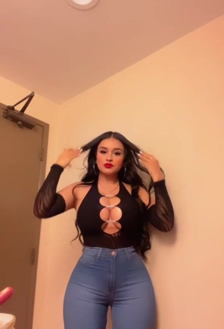 4. Luscious Marlene Santana Shows Cleavage in Black Top (Side Boob)