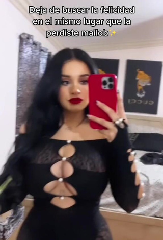 3. Titillating Marlene Santana Shows Cleavage in Black Overall (Side Boob)