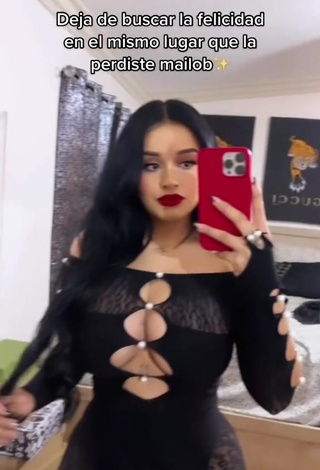 4. Titillating Marlene Santana Shows Cleavage in Black Overall (Side Boob)