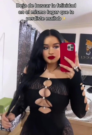 5. Titillating Marlene Santana Shows Cleavage in Black Overall (Side Boob)