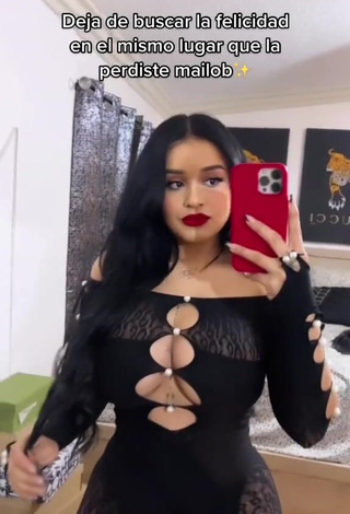 6. Titillating Marlene Santana Shows Cleavage in Black Overall (Side Boob)