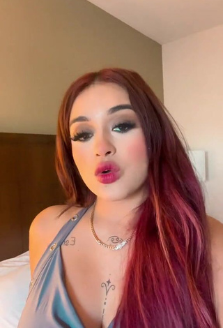 Sultry Marlene Santana Shows Cleavage in Crop Top