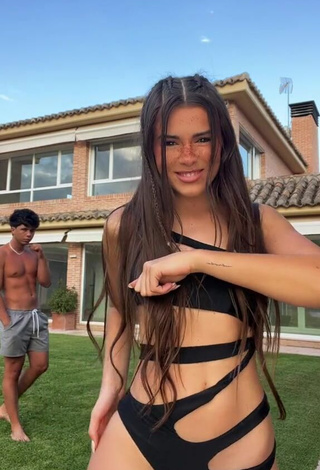 4. Titillating Mar Lucas Vilar Shows Cleavage in Black Swimsuit