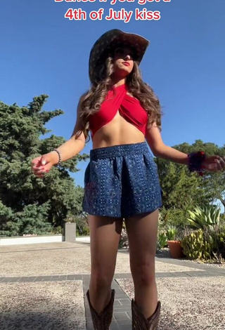 3. McKenzi Brooke in Seductive Red Crop Top (Side Boob)