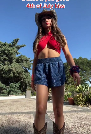 4. McKenzi Brooke in Seductive Red Crop Top (Side Boob)