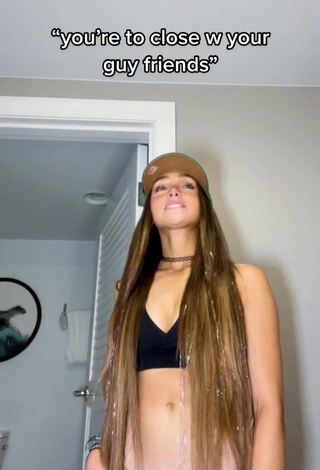 2. McKenzi Brooke Shows Cleavage in Hot Black Crop Top