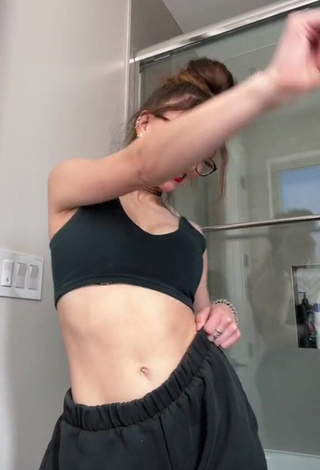 Dazzling McKenzi Brooke Shows Cleavage in Inviting Black Crop Top