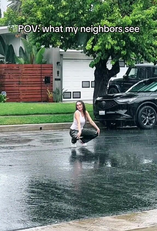 5. Luscious McKenzi Brooke in White Tank Top in a Street