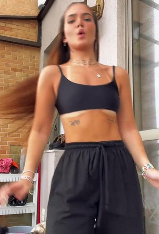 Really Cute Mel Maia Shows Cleavage in Black Crop Top