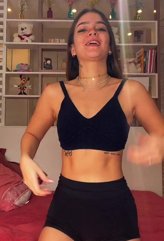 Cute Mel Maia Shows Cleavage in Black Crop Top