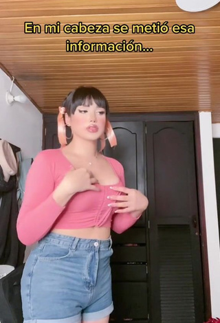 4. Mirandah Shows Cleavage in Alluring Peach Crop Top