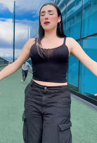 Dazzling Mirandah Shows Cleavage in Inviting Black Crop Top